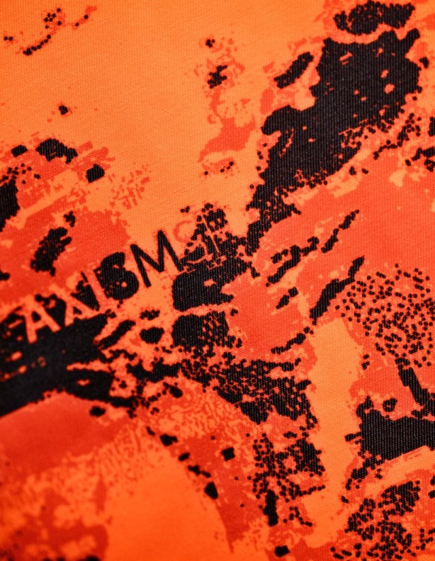 Harkila Wildboar Pro Blaze Camo Jacket - a close-up of the orange camouflage pattern.